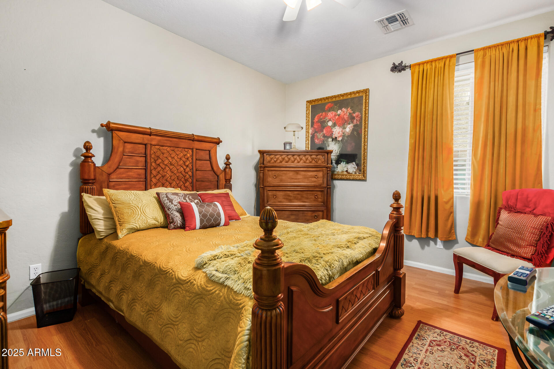 6635 South Cottonfields Lane Laveen, AZ 85339 - Photo 35 of 49 a bed sitting in a bedroom next to a window