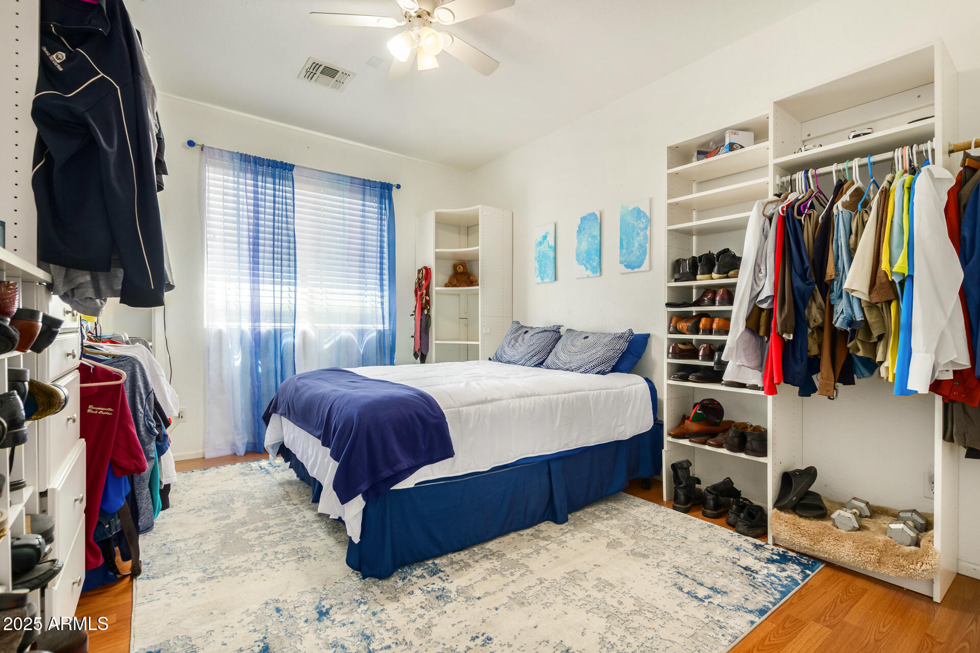 6635 South Cottonfields Lane Laveen, AZ 85339 - Photo 37 of 49 a bedroom with a large bed and a window