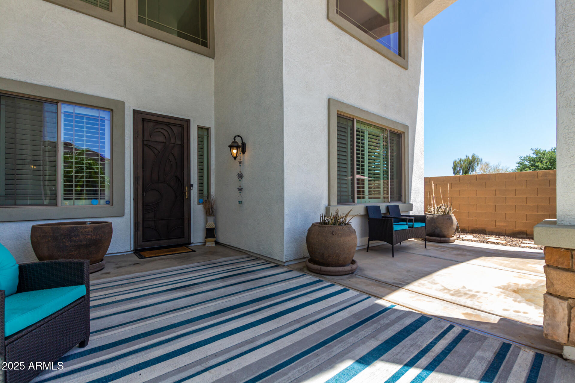 6635 South Cottonfields Lane Laveen, AZ 85339 - Photo 4 of 49 a view of a two chairs in the roof deck