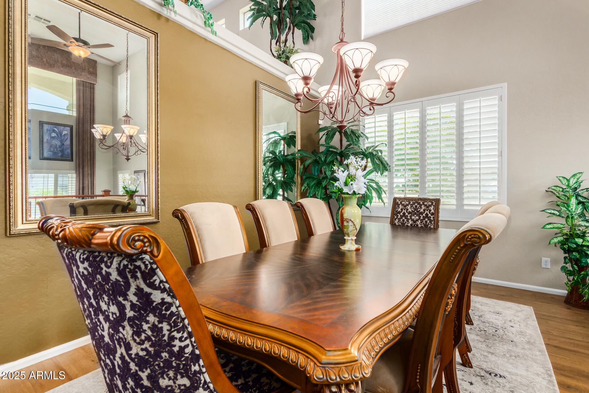 6635 South Cottonfields Lane Laveen, AZ 85339 - Photo 9 of 49 a view of a dining room with furniture and a chandelier