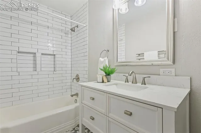 a bathroom with a sink and a bathtub