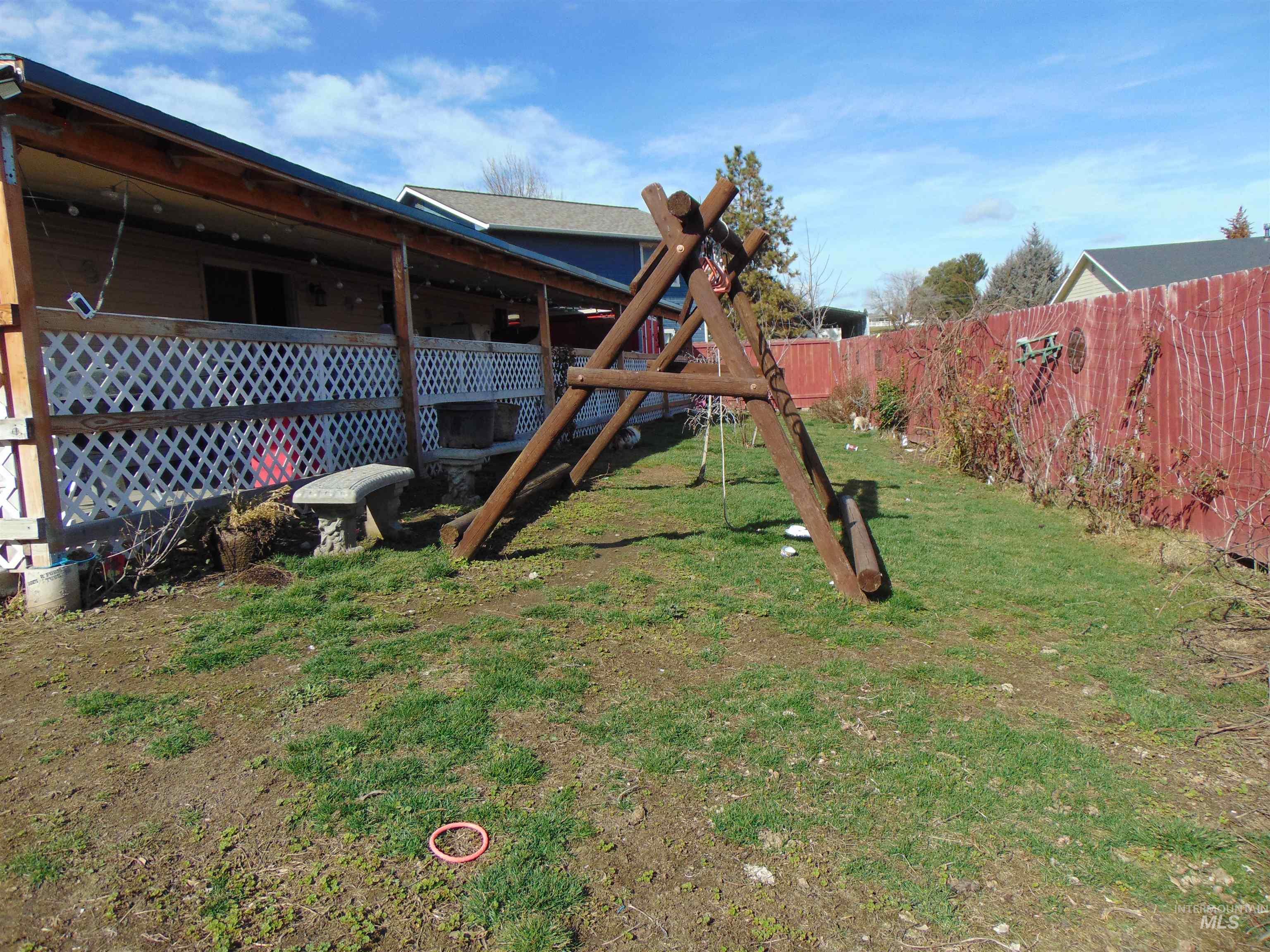 30 Maple Drive Weiser, ID 83672 - Photo 17 of 17 Fenced yard featuring a playground