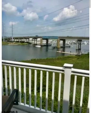a view of a lake from a balcony