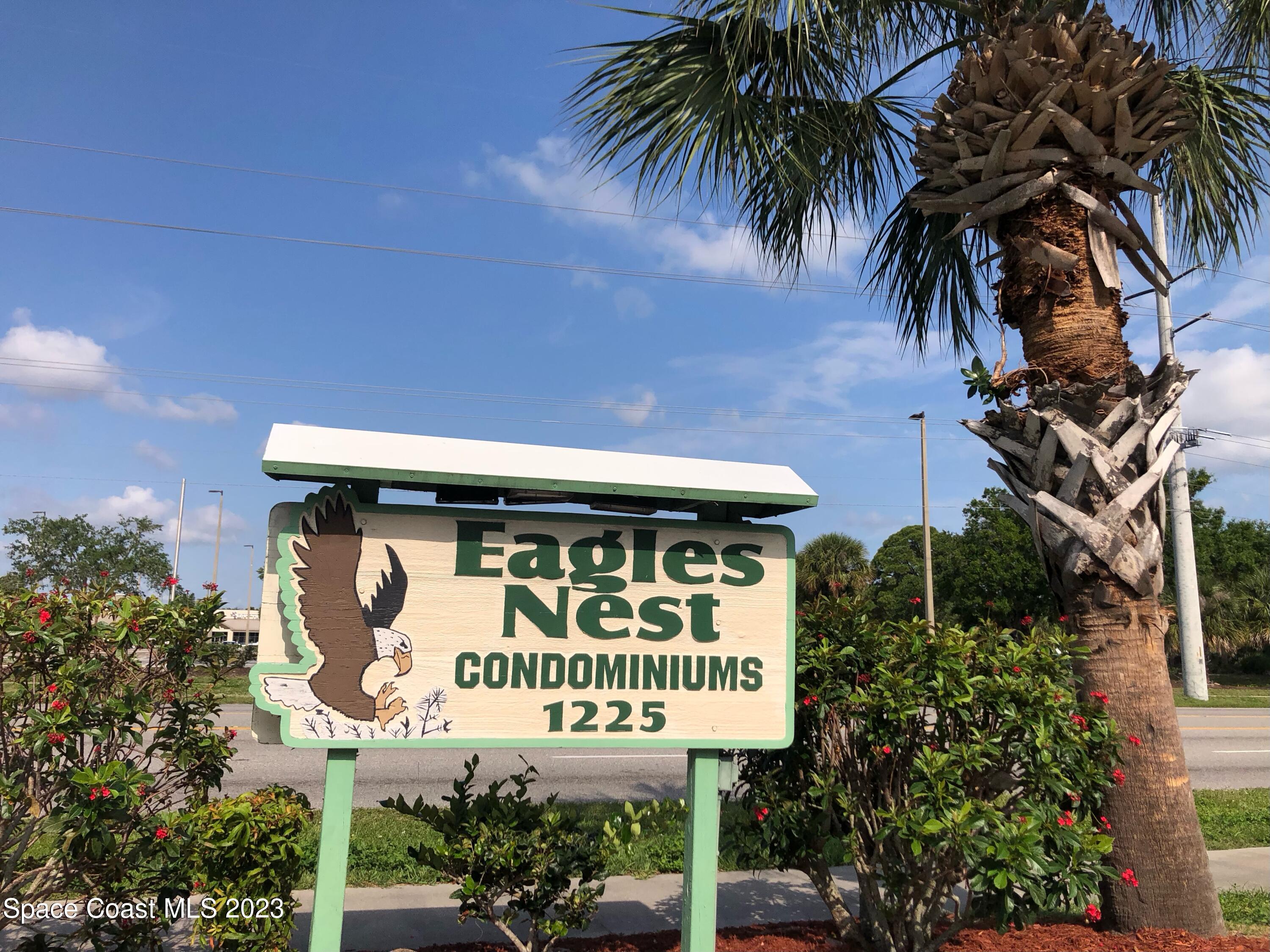 1225 North Wickham Road, Unit 721 Melbourne, FL 32935 - Photo 3 of 18 Eagle's Nest Entrance