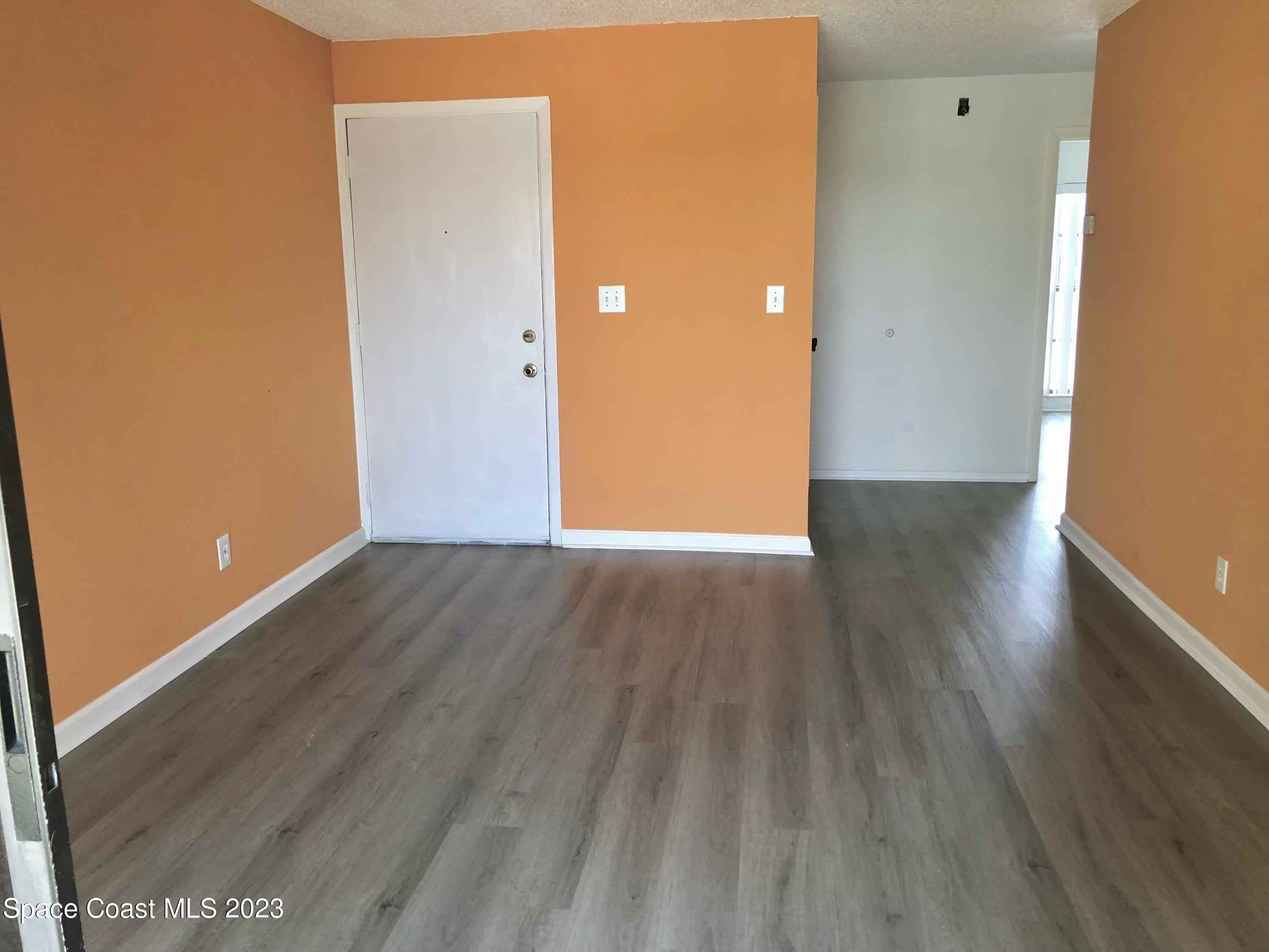 1225 North Wickham Road, Unit 721 Melbourne, FL 32935 - Photo 5 of 18 Living Room