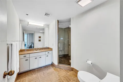 a outdoor space with lots of furniture and wooden floor