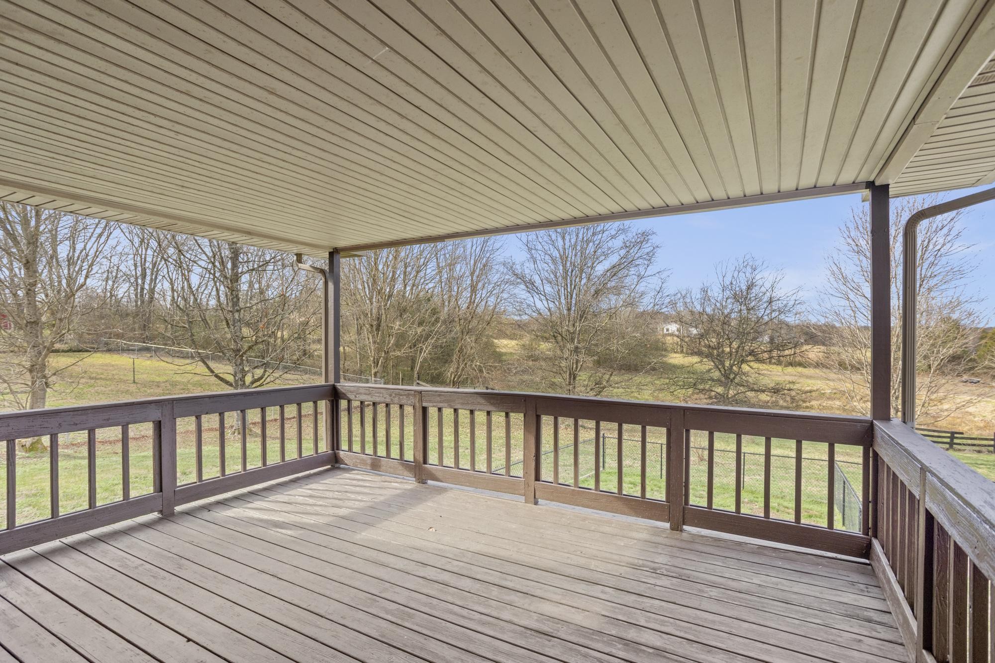 1053 Johns Road Joelton, TN 37080 - Photo 35 of 83 a view of a balcony with wooden floor