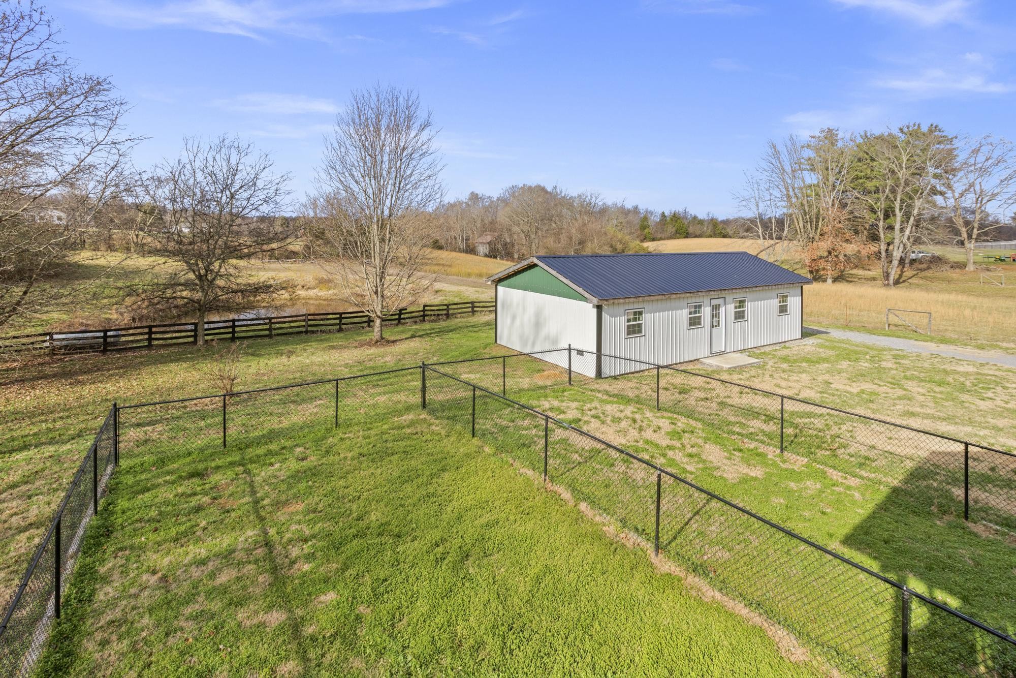 1053 Johns Road Joelton, TN 37080 - Photo 37 of 83 a swimming pool with an outdoor space and seating area