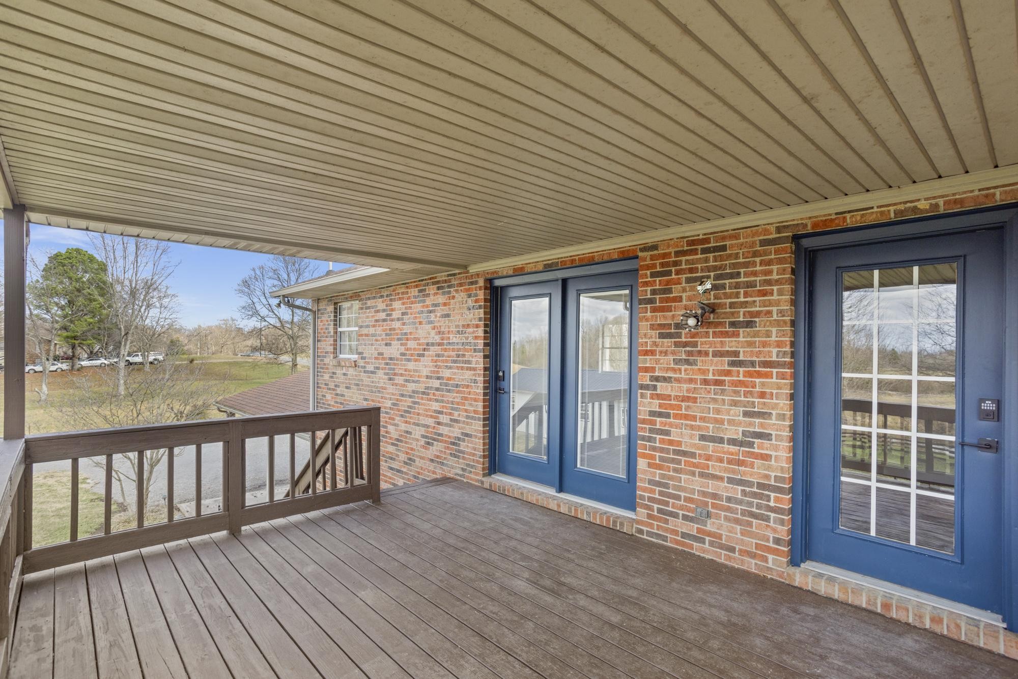 1053 Johns Road Joelton, TN 37080 - Photo 38 of 83 a view of a porch with wooden floor
