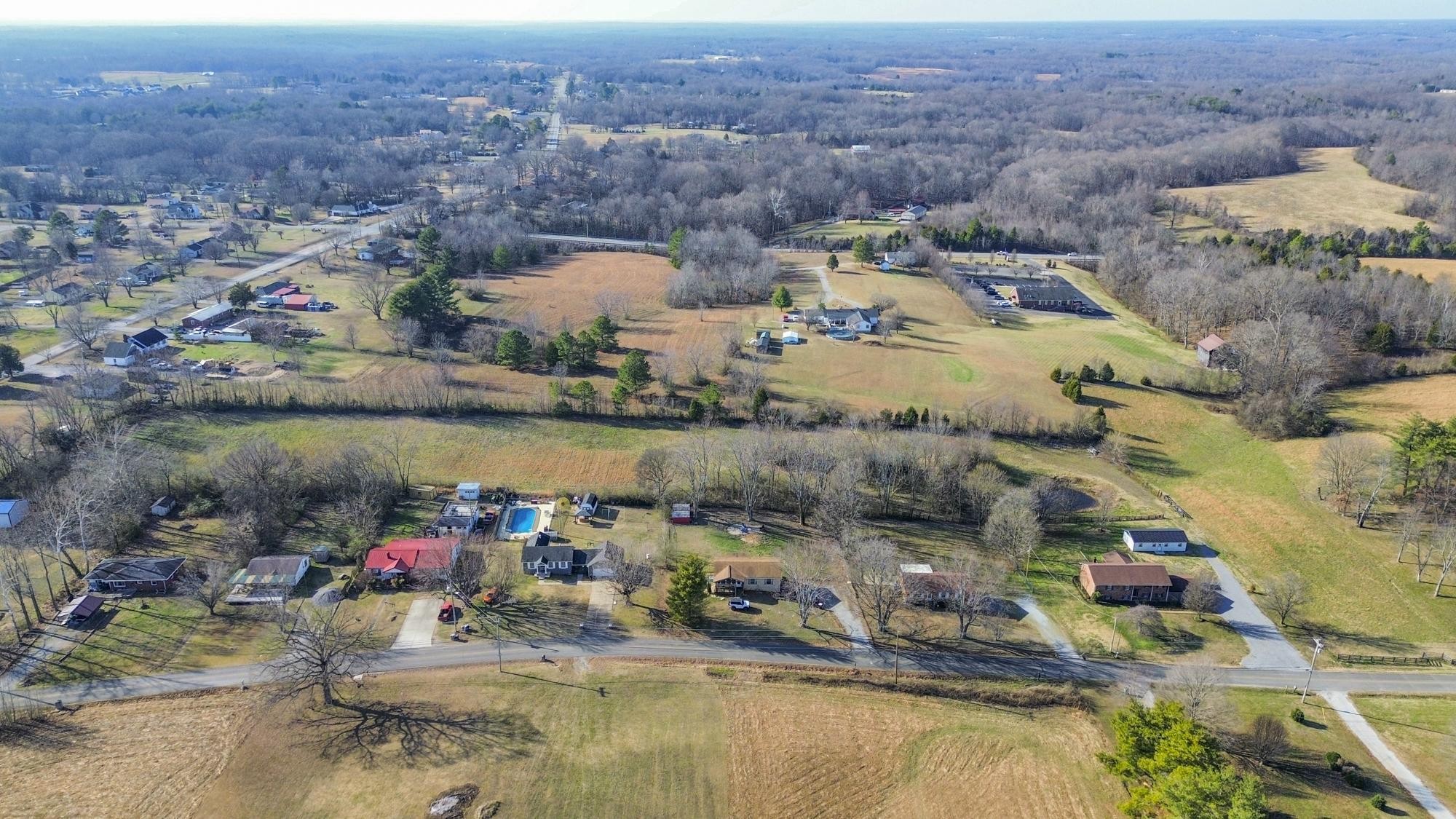 1053 Johns Road Joelton, TN 37080 - Photo 77 of 83 an aerial view of a house with a lake view