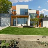 a backyard of a house with lots of green space