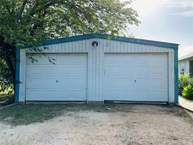 a view of outdoor space and garage