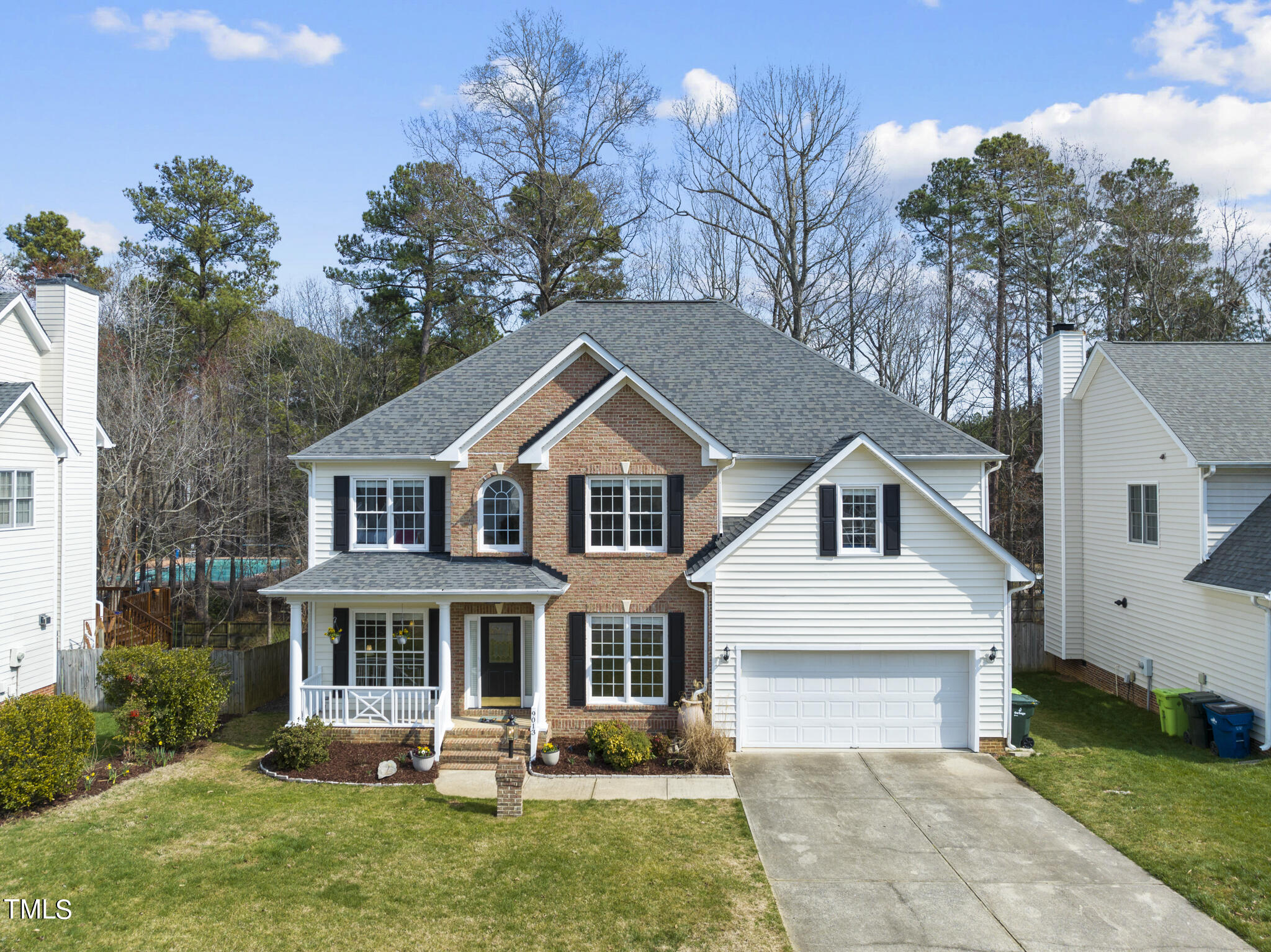 9013 Miranda Drive Raleigh, NC 27617 - Photo 1 of 41 a front view of a house with garden