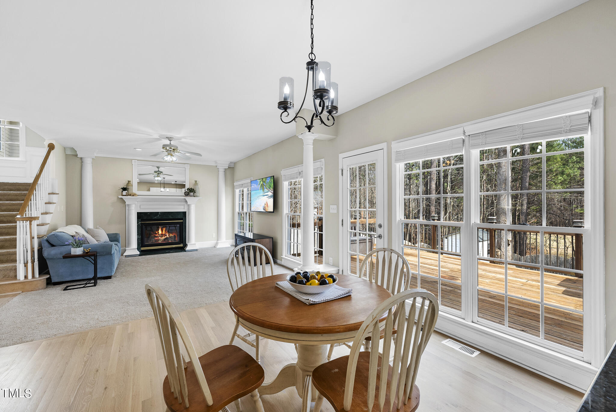 9013 Miranda Drive Raleigh, NC 27617 - Photo 13 of 41 a view of a livingroom with furniture window and wooden floor