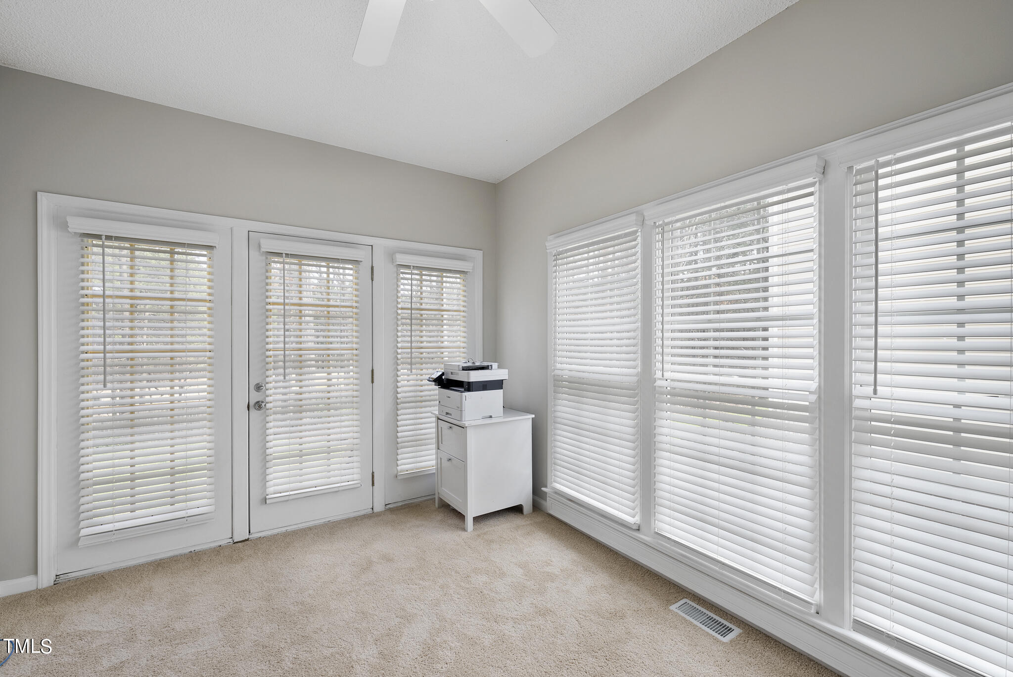 9013 Miranda Drive Raleigh, NC 27617 - Photo 16 of 41 a view of an empty room with a window