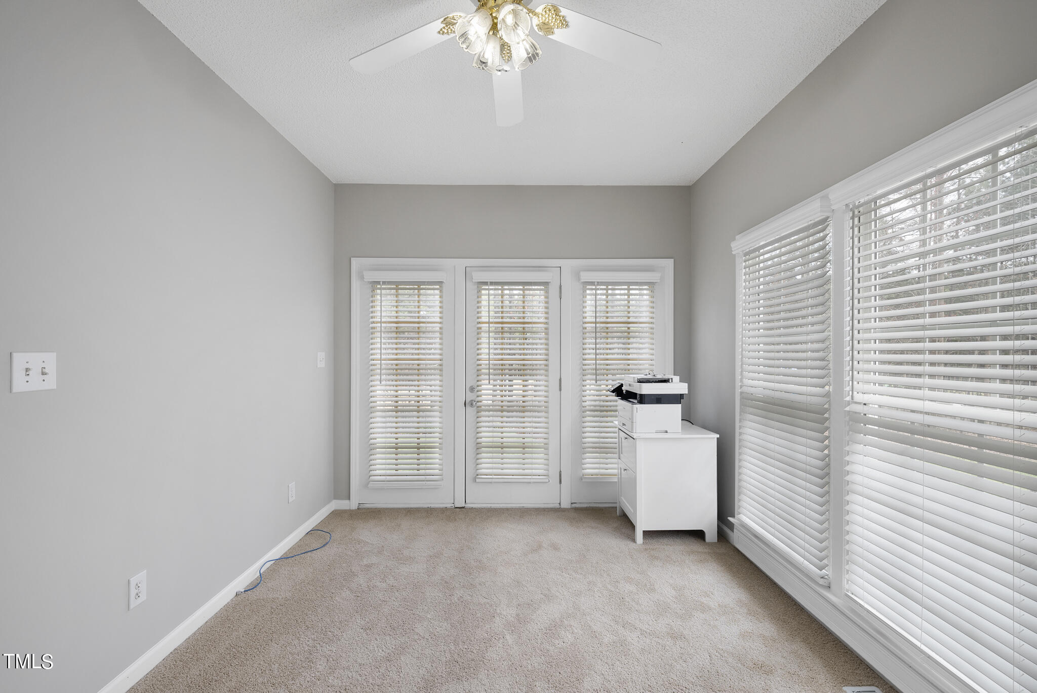 9013 Miranda Drive Raleigh, NC 27617 - Photo 17 of 41 wooden floor in an empty room with a window