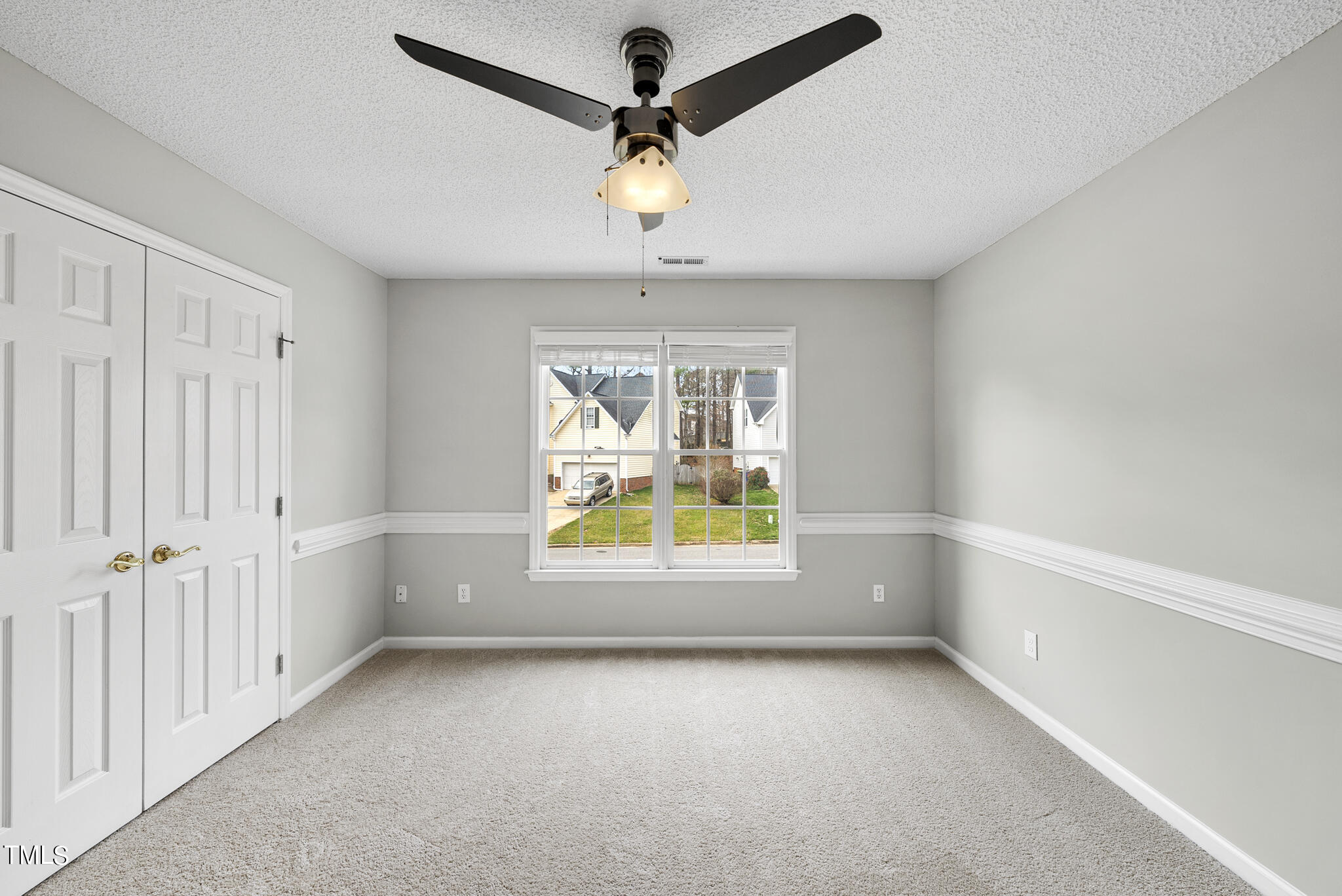 9013 Miranda Drive Raleigh, NC 27617 - Photo 29 of 41 wooden floor in an empty room with a window