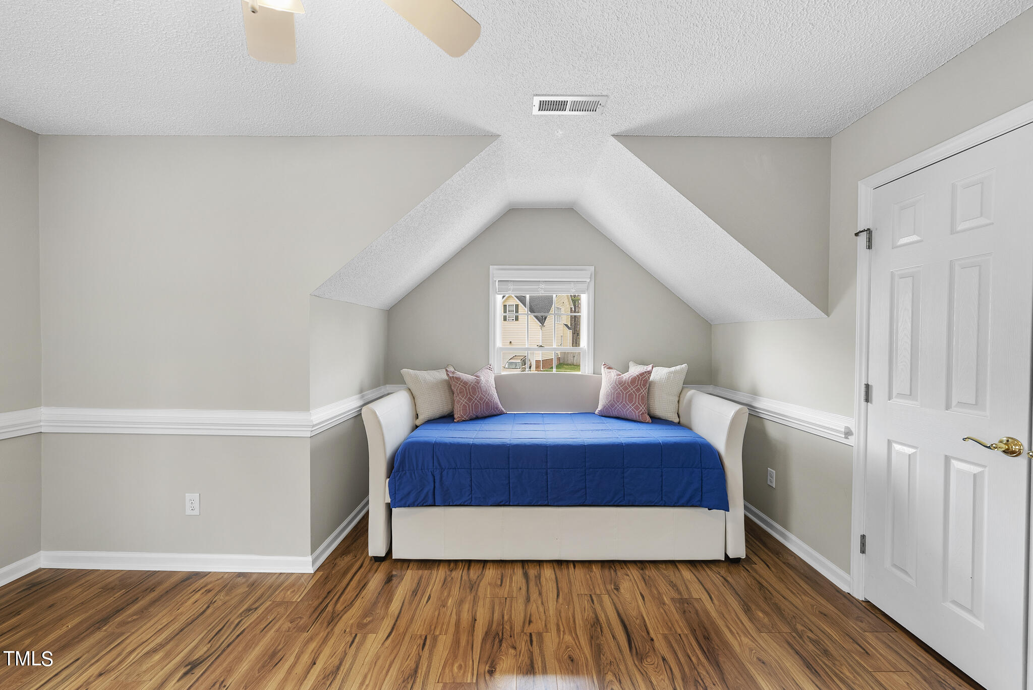 9013 Miranda Drive Raleigh, NC 27617 - Photo 30 of 41 a bedroom with a bed and a window