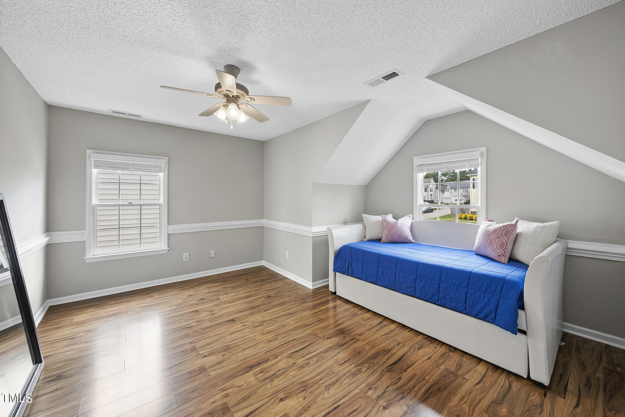 9013 Miranda Drive Raleigh, NC 27617 - Photo 31 of 41 a bedroom with furniture and window