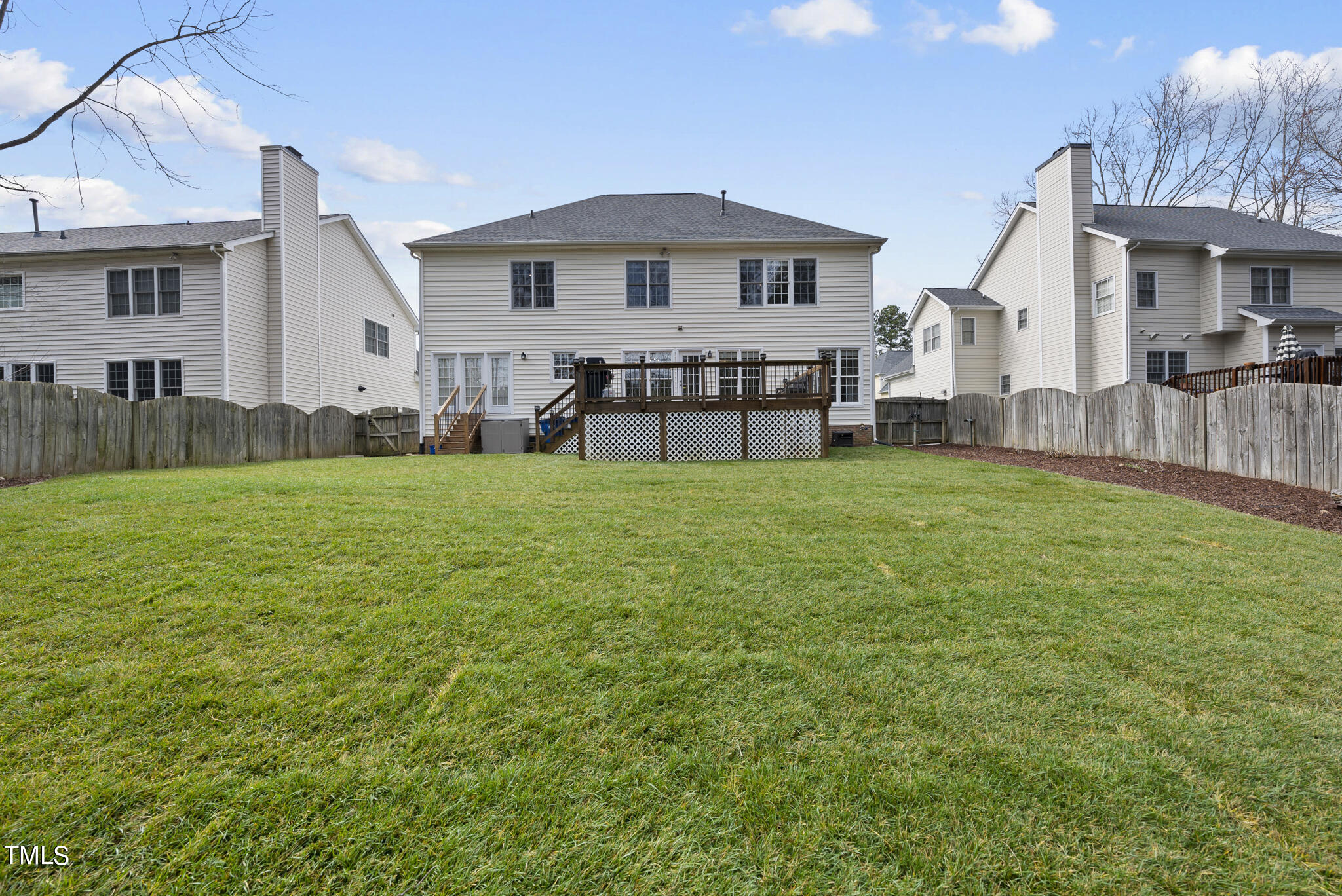 9013 Miranda Drive Raleigh, NC 27617 - Photo 37 of 41 a view of a house with a yard and sitting area