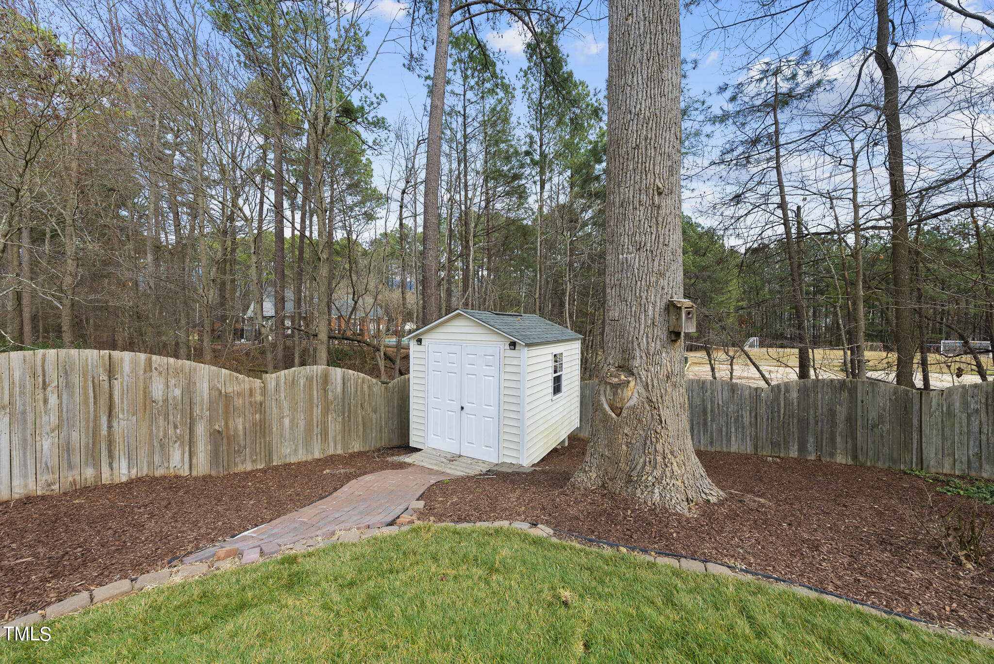 9013 Miranda Drive Raleigh, NC 27617 - Photo 38 of 41 a view of backyard with tree