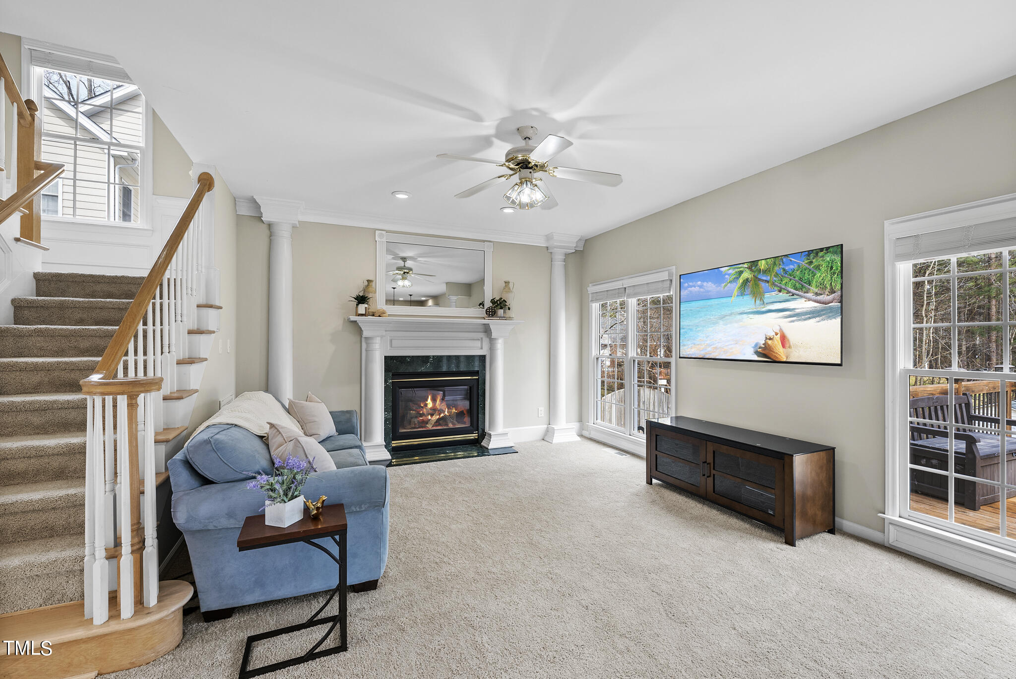 9013 Miranda Drive Raleigh, NC 27617 - Photo 8 of 41 a living room with furniture and a fireplace