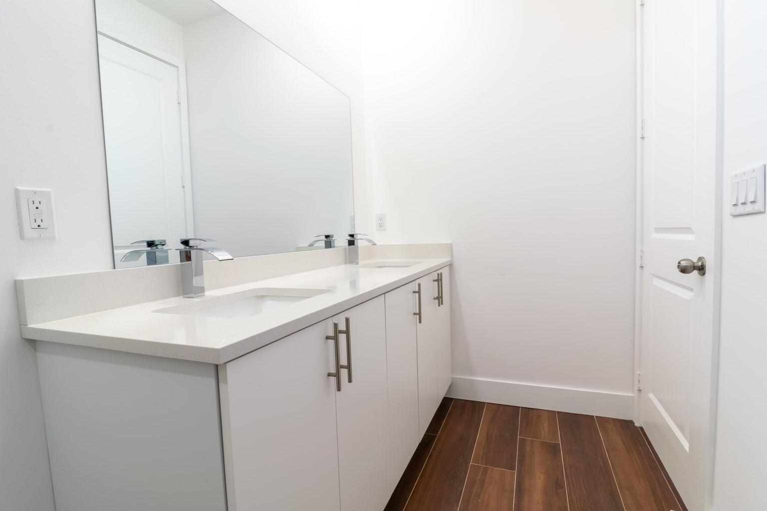 15061 Brainbridge Circle Port Charlotte, FL 33981 - Photo 19 of 21 a bathroom with a sink and a mirror