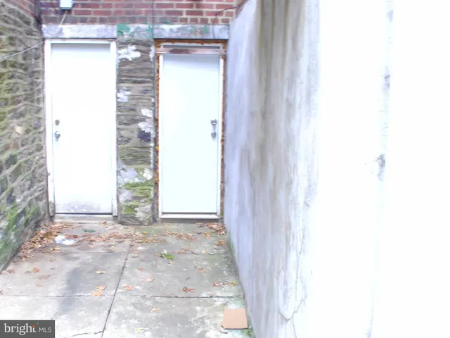 a view of a room with a white cabinet