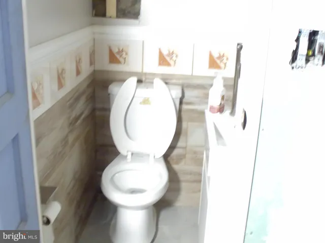 a close view of a toilet in a bathroom