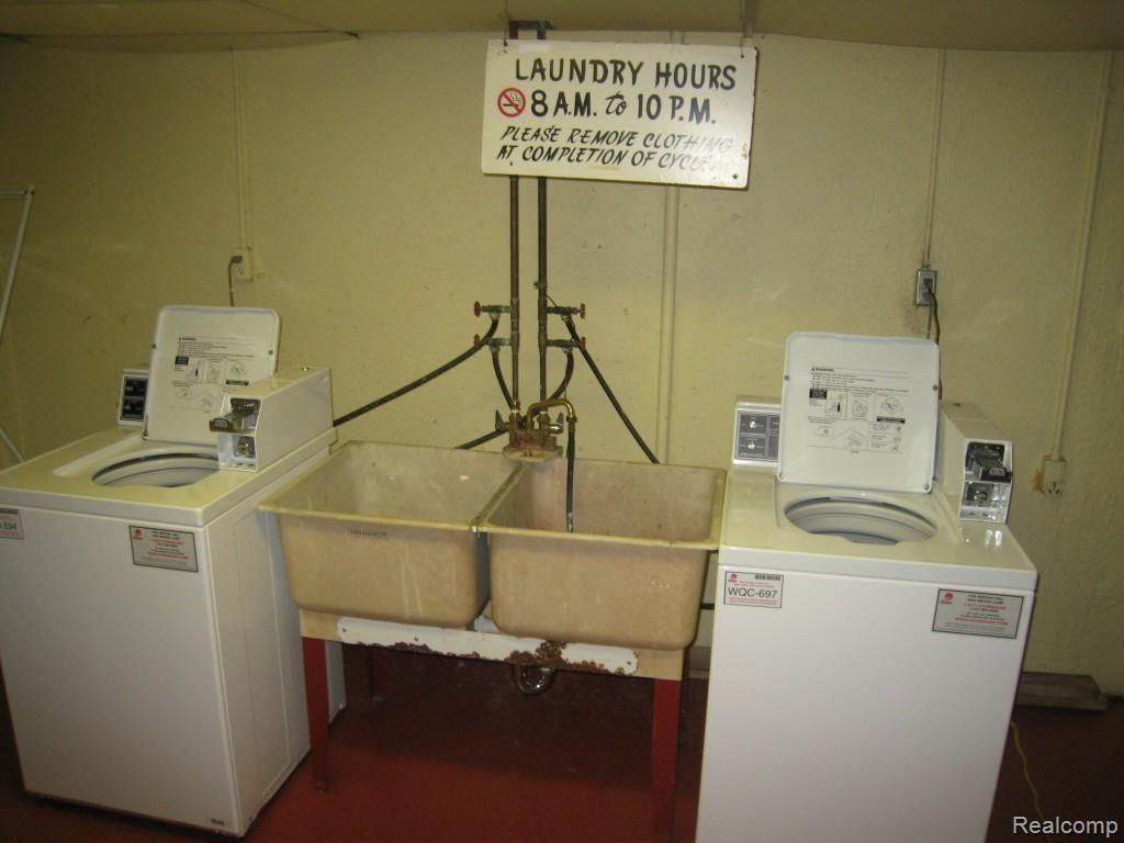 24111 Meridian Road, Unit 119 Grosse Ile, MI 48138 - Photo 12 of 15 LAUNDRY FACILITIES.jpg