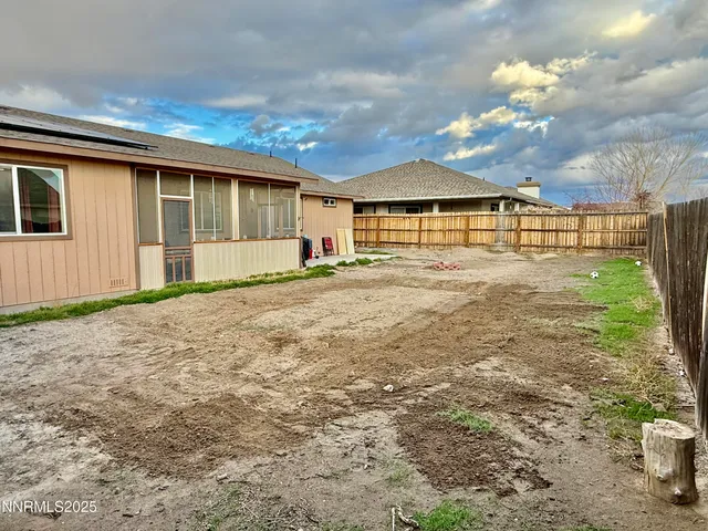 a big room with table and chairs