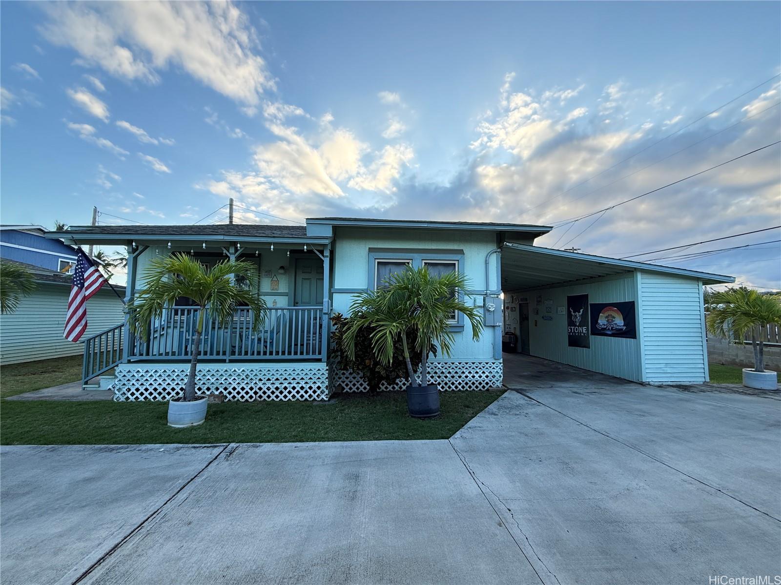 91-249 Ewa Beach Road Ewa Beach, HI 96706 - Photo 6 of 25 a view of a house with garage