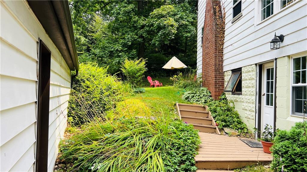 815 Pittsburgh Road Butler, PA 16002 - Photo 3 of 27 a view of a garden with potted plants