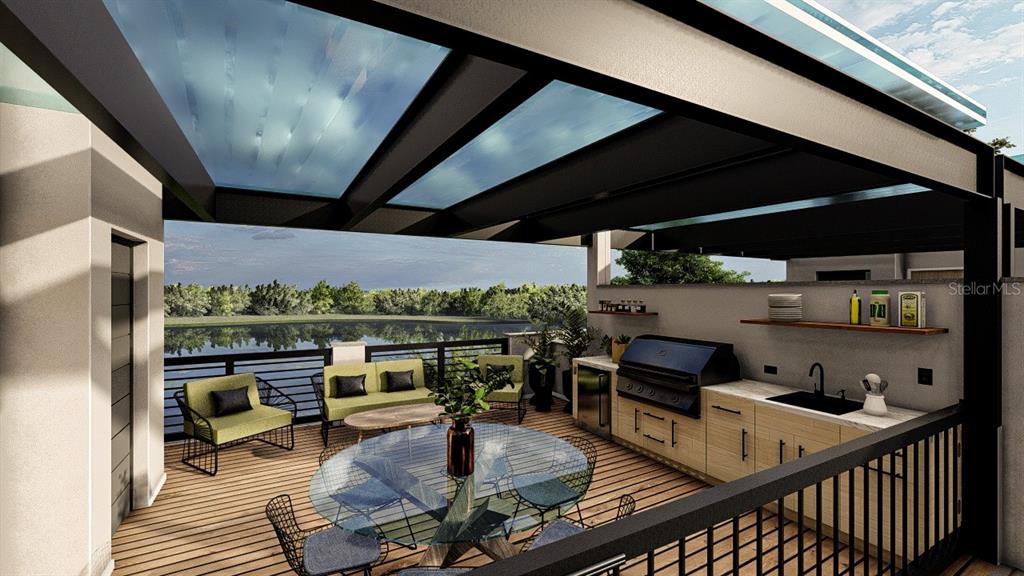 10775 Rodeo Drive, Unit TBD Lakewood Ranch, FL 34202 - Photo 7 of 10 a living room with furniture a rug and a table