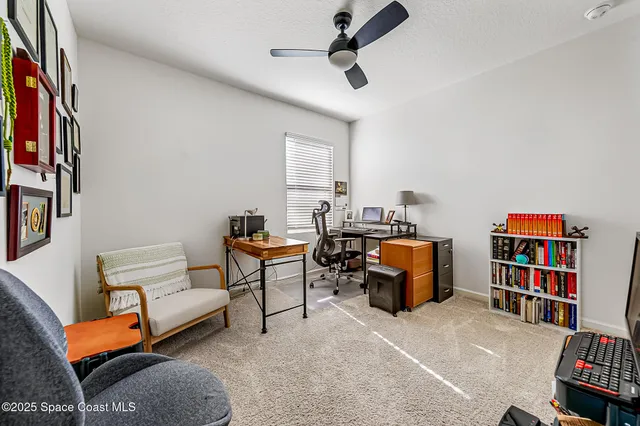a view of a livingroom with furniture and a livingroom