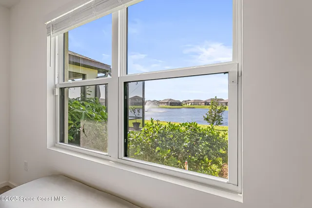 a living room with fireplace furniture and a flat screen tv