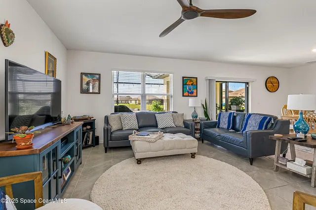 a view of a tennis ground with a small yard