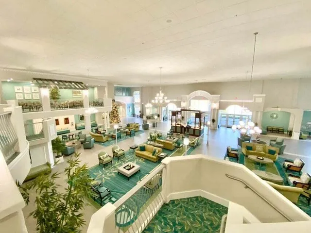 a very nice looking dining room with a large window and breakfast area