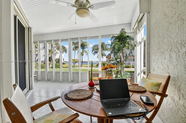 a bedroom with a bed and a lamp