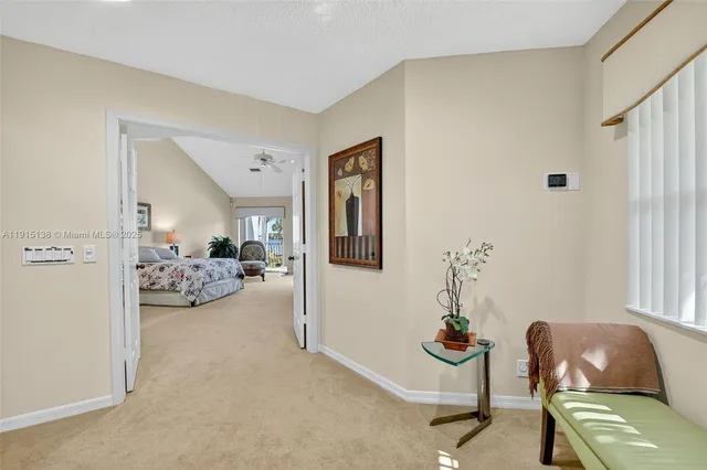 a bathroom with a toilet a sink and shower