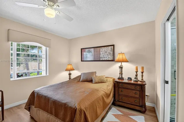 a view of a house with backyard and garden