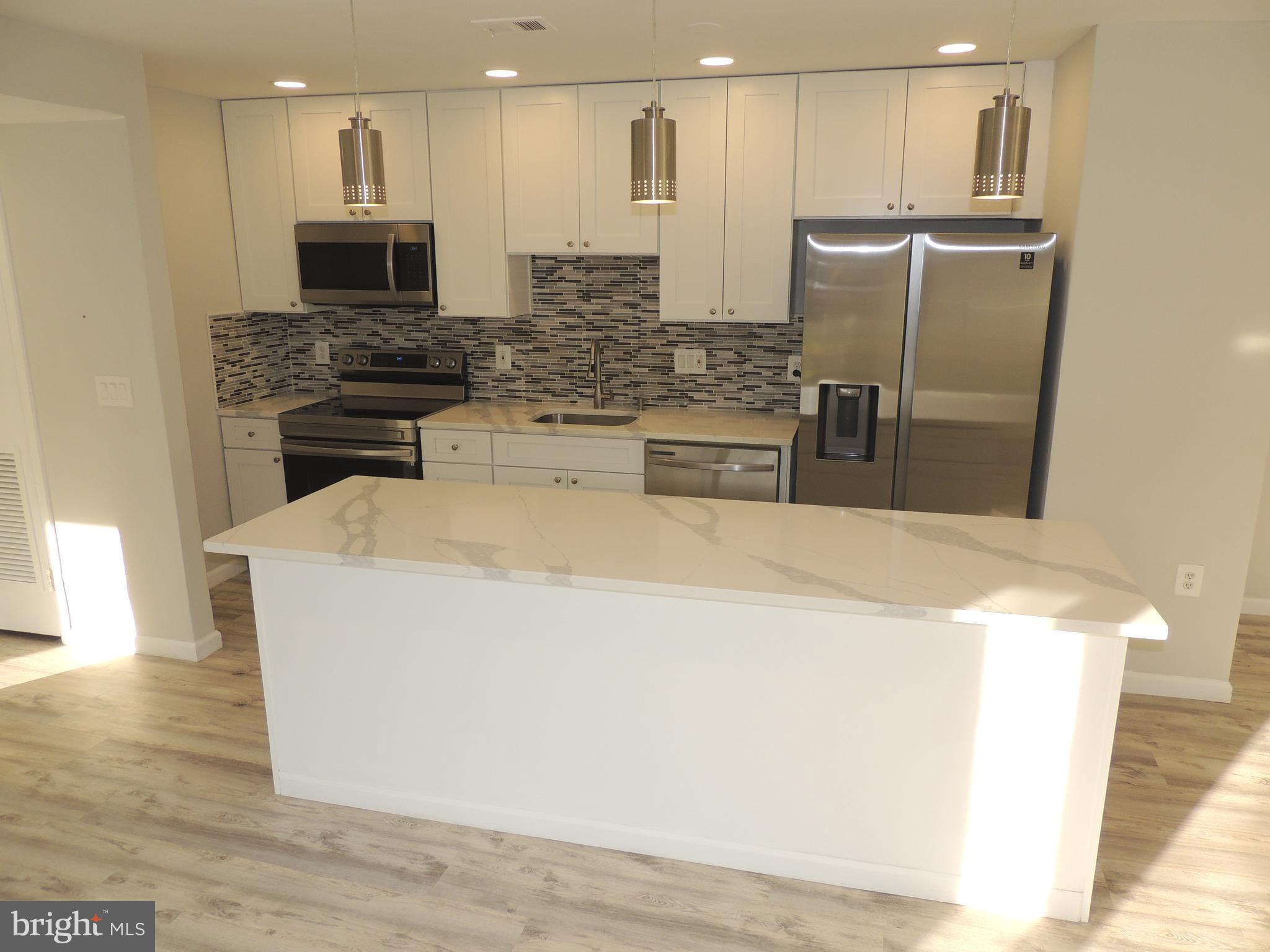 3812 Bel Pre Road, Unit 38122 Silver Spring, MD 20906 - Photo 10 of 34 Quartz countertops