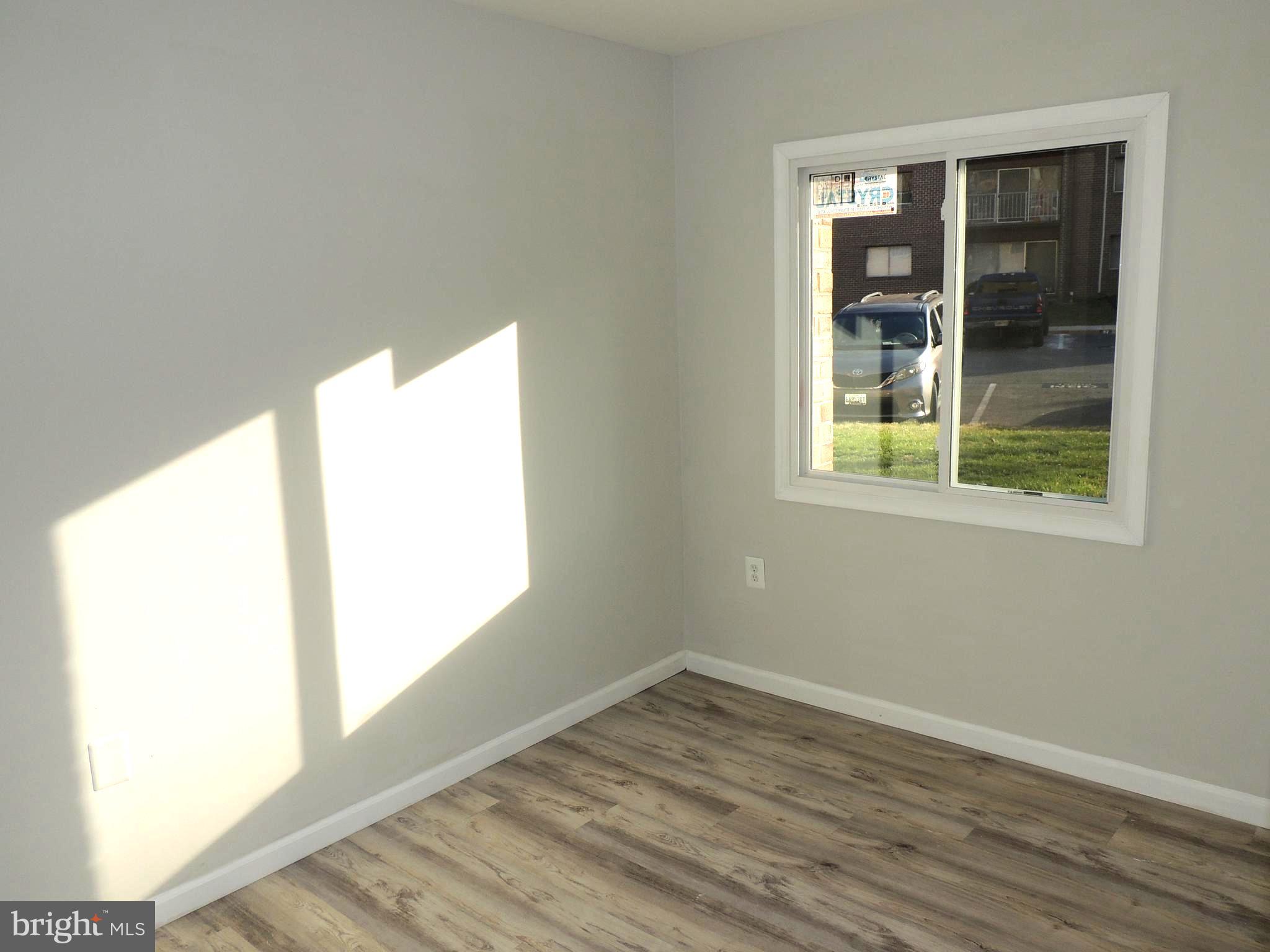 3812 Bel Pre Road, Unit 38122 Silver Spring, MD 20906 - Photo 29 of 34 Bright bedroom 3