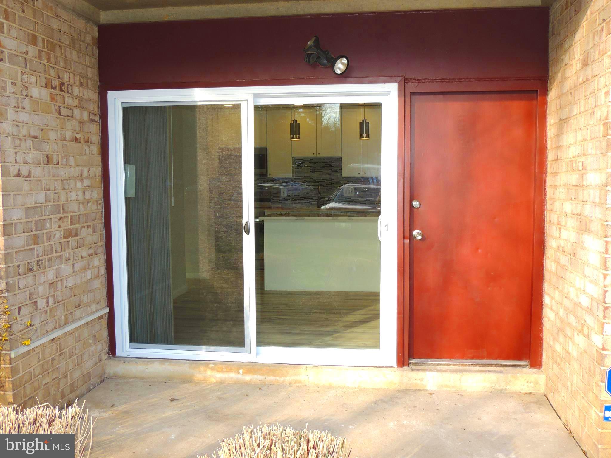 3812 Bel Pre Road, Unit 38122 Silver Spring, MD 20906 - Photo 33 of 34 Rear access to reserved parking space #44