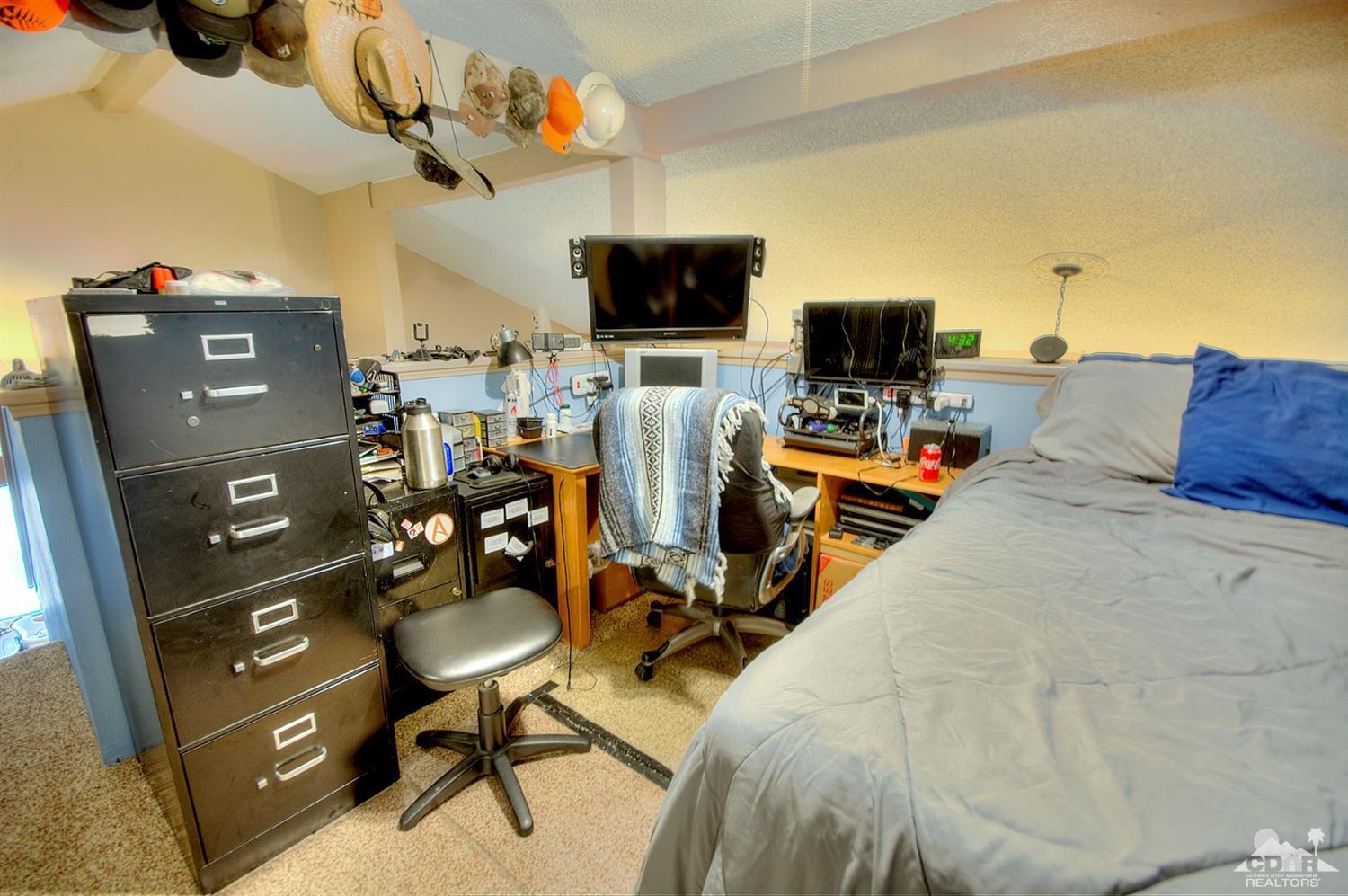 47395 Monroe Street, Unit 191 Indio, CA 92201 - Photo 18 of 21 a view of a workspace with furniture