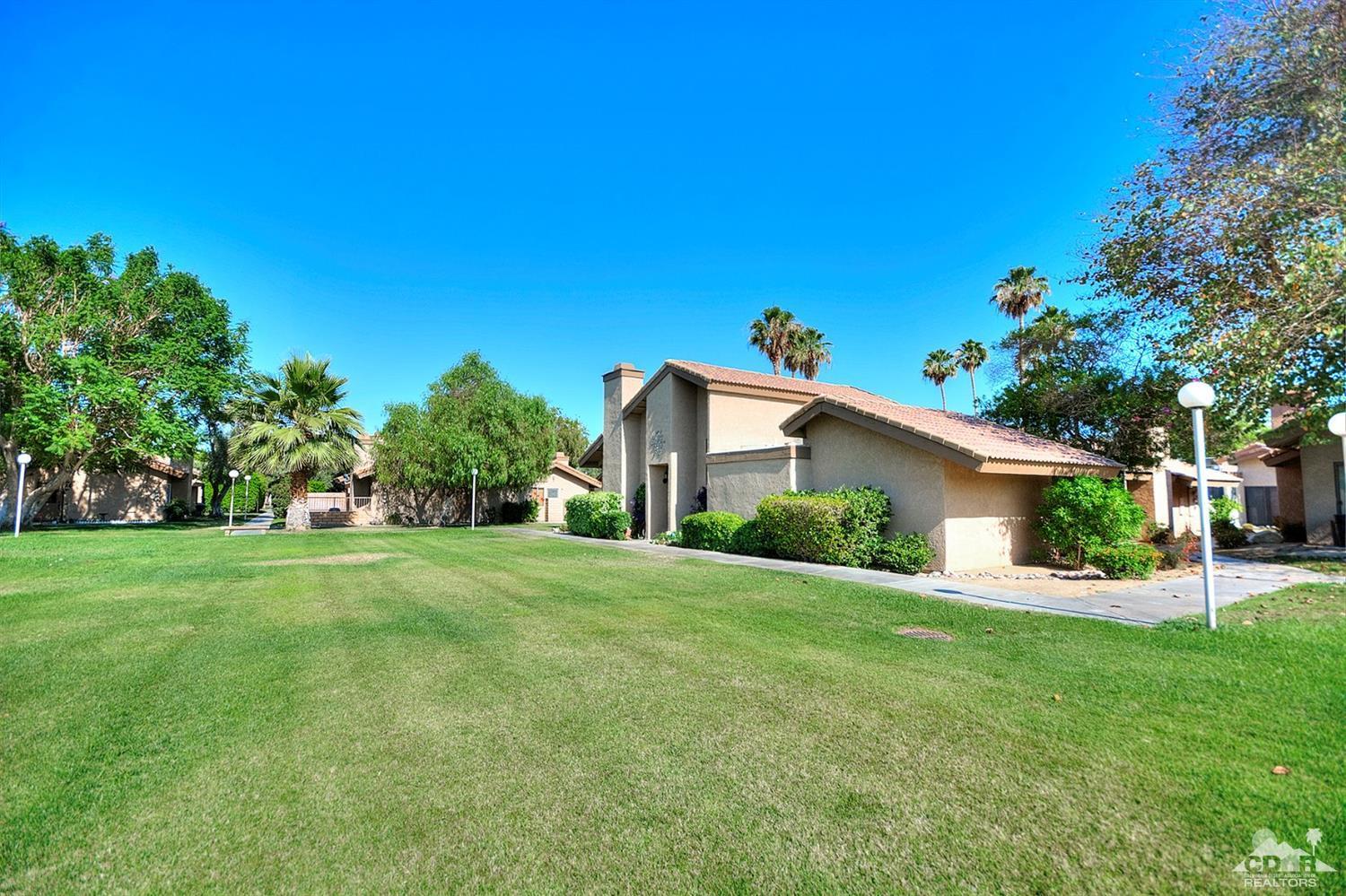 47395 Monroe Street, Unit 191 Indio, CA 92201 - Photo 20 of 21 a house view with a garden space