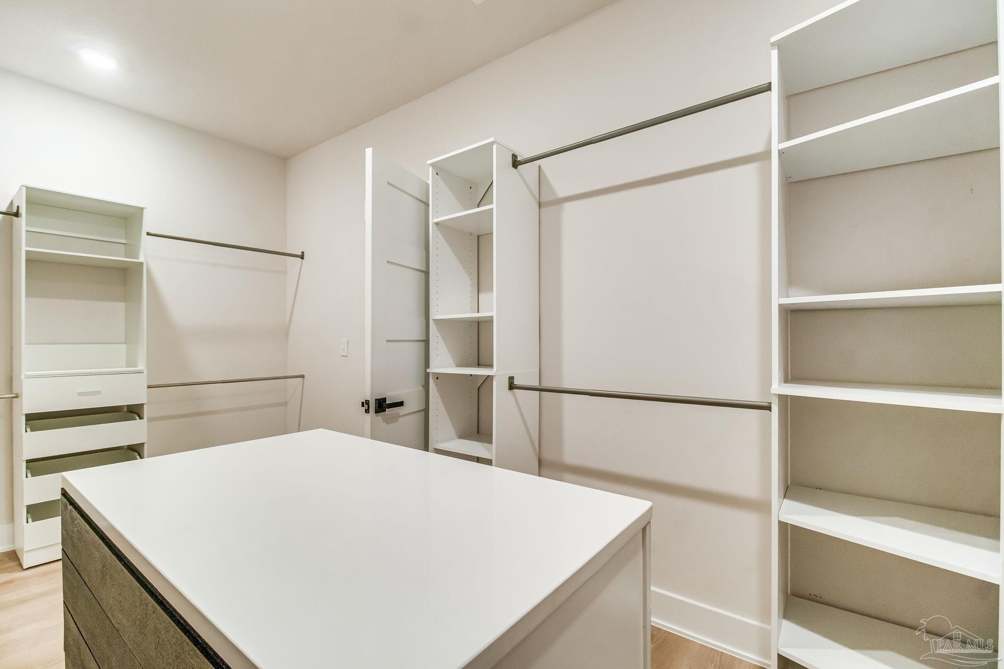 2329 Molino Bridge Road Pace, FL 32571 - Photo 34 of 65 a white refrigerator freezer and a stove sitting inside of a kitchen