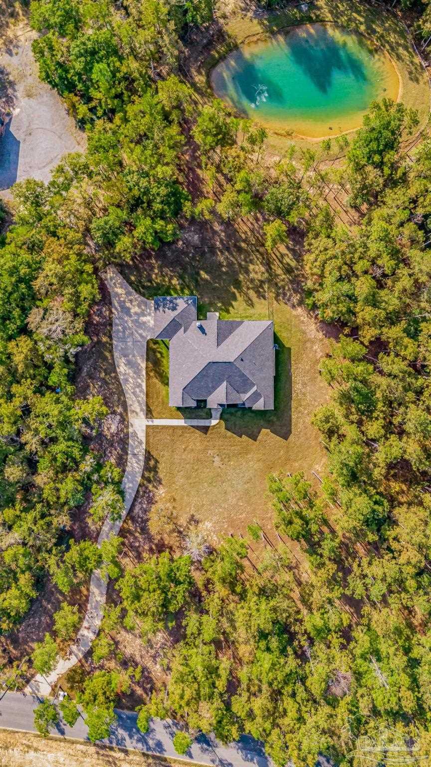 2329 Molino Bridge Road Pace, FL 32571 - Photo 60 of 65 a view of an outdoor space and a yard