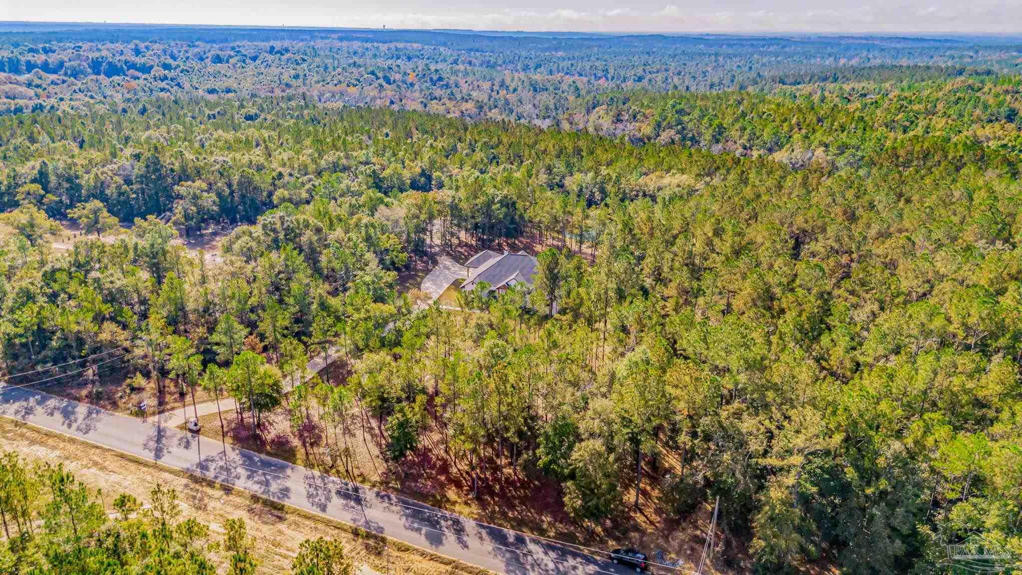 2329 Molino Bridge Road Pace, FL 32571 - Photo 62 of 65 a view of an outdoor space and a lake view