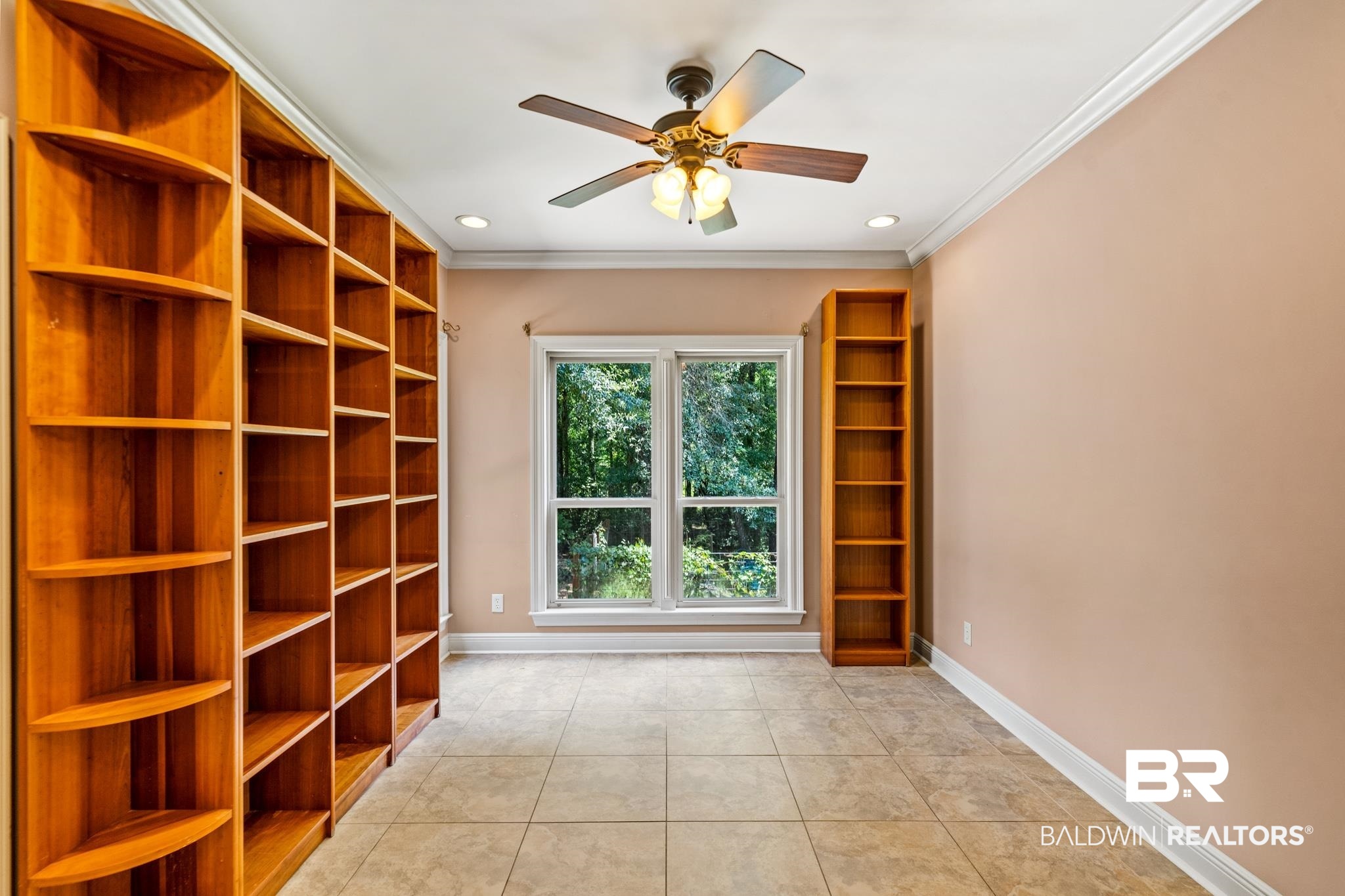 8321 Dixon Road Bay Minette, AL 36507 - Photo 36 of 79 Interior space with light tile patterned floors, crown molding, and ceiling fan